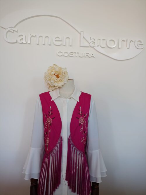 Chaleco flecos fucsia