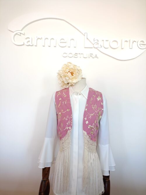 Chaleco flecos rosa maquillaje