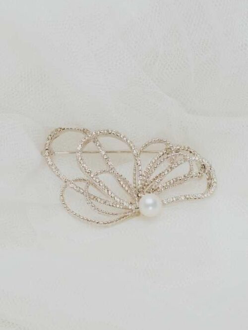 Broche mantilla rodillo